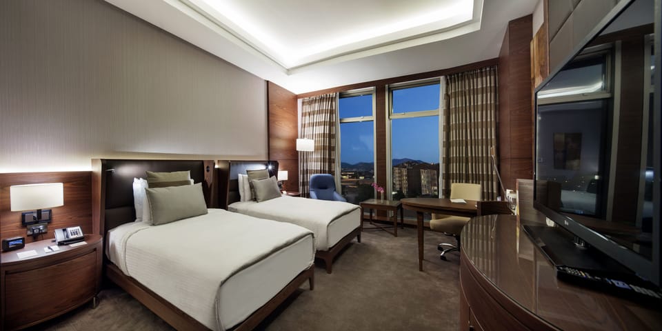 Down comforters, free minibar items, in-room safe, desk