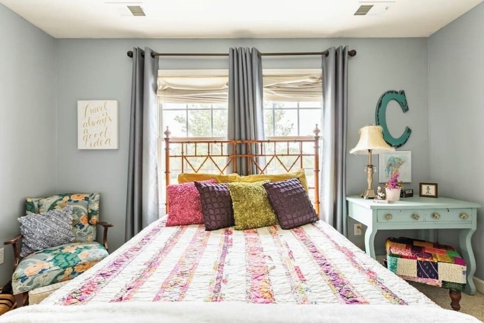 Queen bed in bedroom 3 upstairs. Great farm view. 