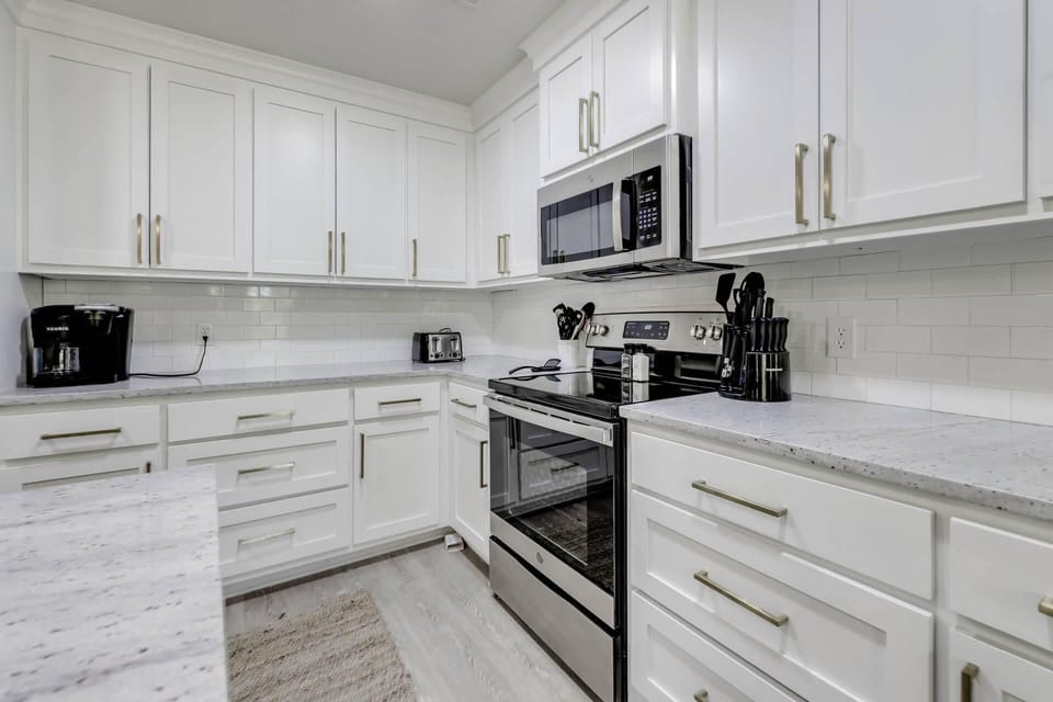 Brand new SS appliances (oven, microwave, dishwasher, & 2 fridges)