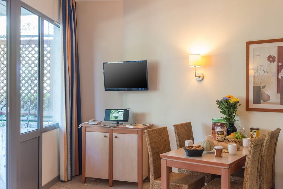 Reconnect with loved ones over a meal at the dining table.