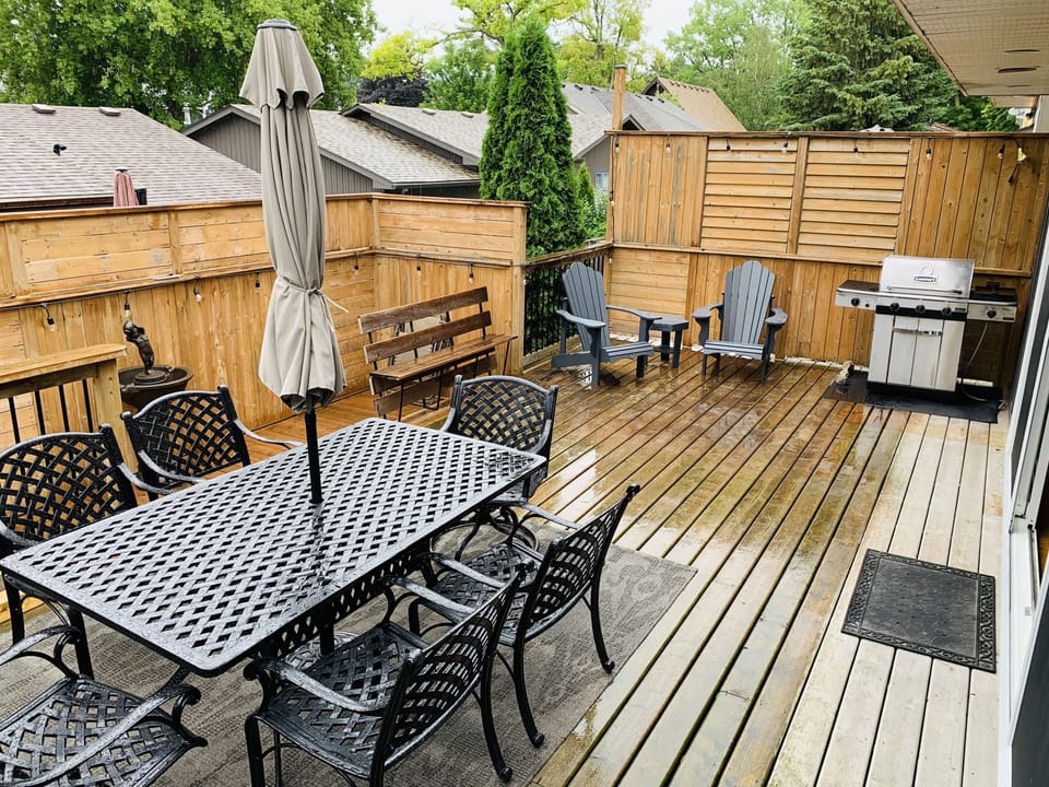 Large deck with ample seating.  Propane fire pit has been added!