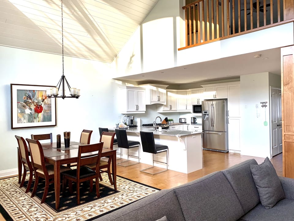 Open concept kitchen, dining and living room