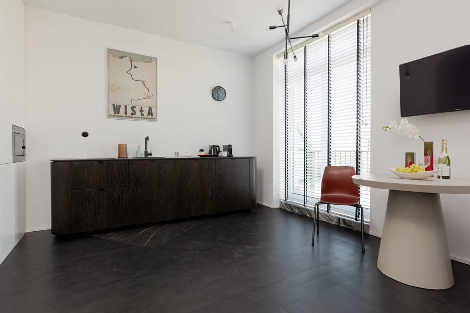 The kitchenette's practical layout maximizes space and functionality.