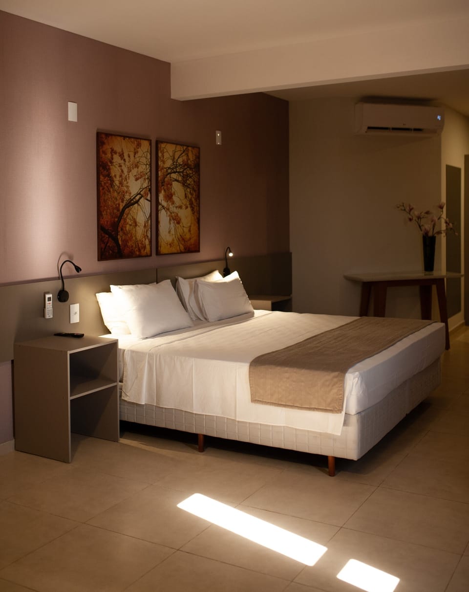 Deluxe Room | Laptop workspace, WiFi (free), bed sheets
