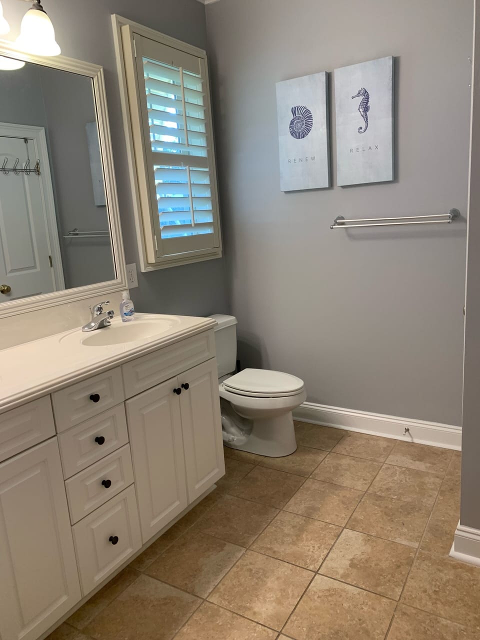 Master bathroom with double vanity and walk-in shower