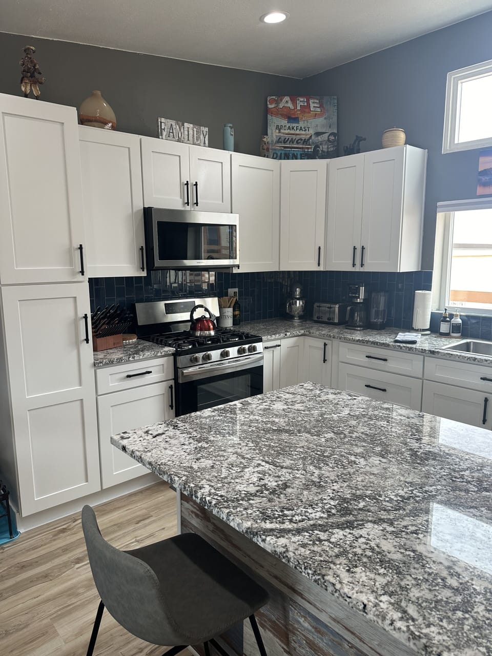 Newly remodeled kitchen with gas oven and microwave