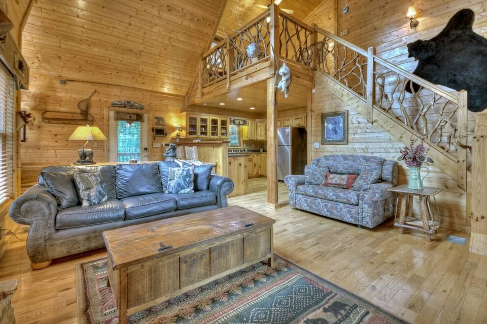 Relax in the living room with the fireplace, games or TV