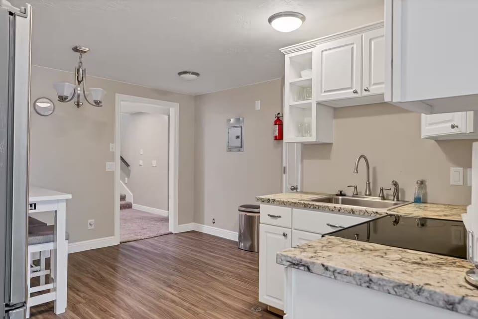 Basement level kitchen w/ dining seating for 2. 
