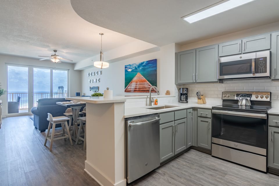The well-appointed kitchen features full-overlay, hardwood cabinets.