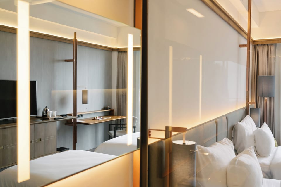 Deluxe Room, 2 Twin Beds, Balcony, City View | Free minibar, in-room safe, desk, laptop workspace