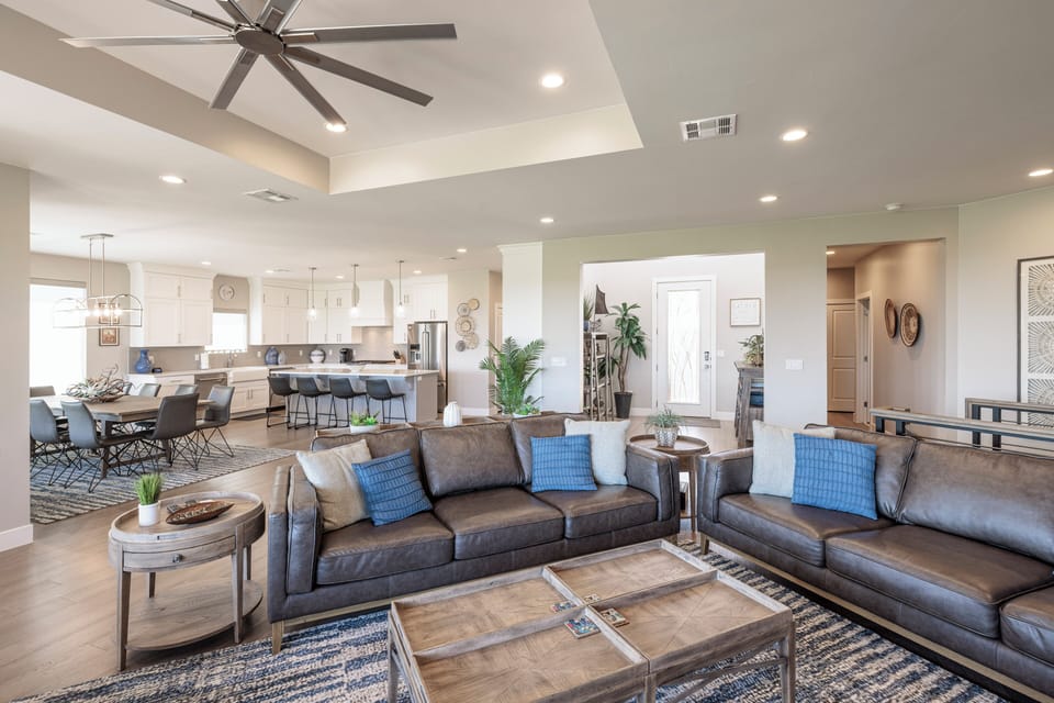 Large Great Room - The Large Great Room includes an oversized dining table, gourmet kitchen, and the perfect seating area for relaxing and watching your favorite movie or tv program.