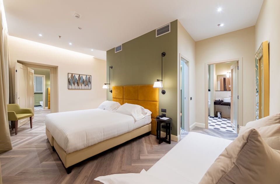 Family Room | Minibar, in-room safe, desk, soundproofing