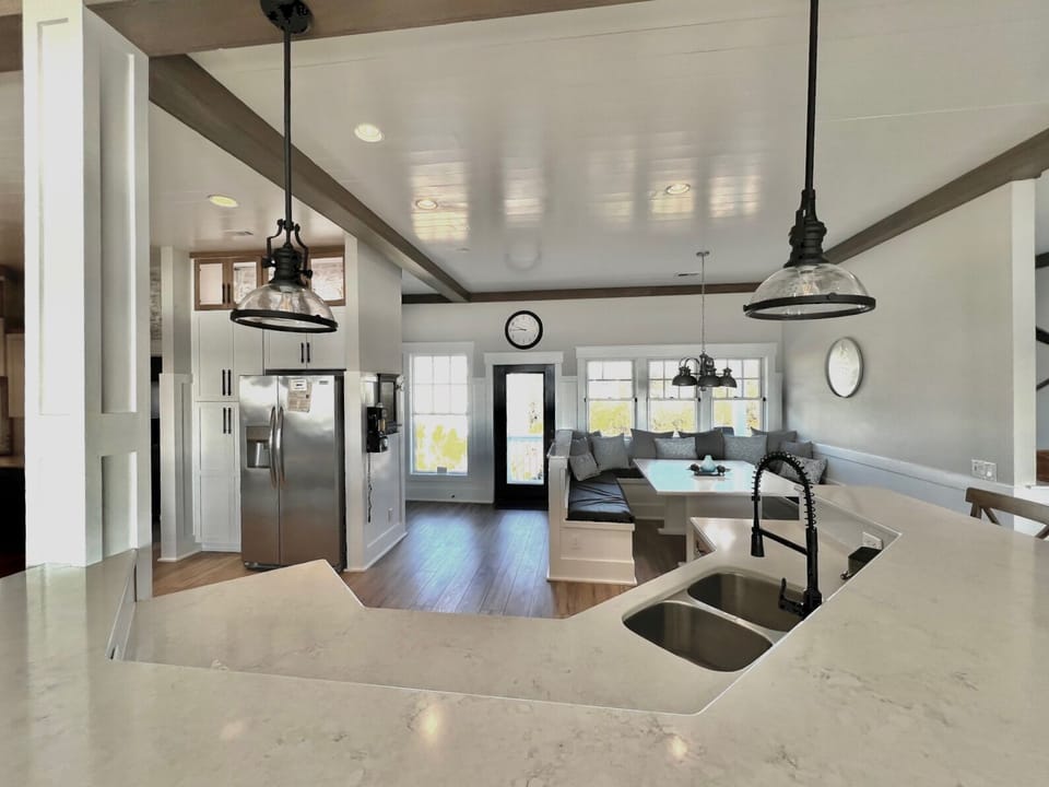 Kitchen with outdoor grilling deck