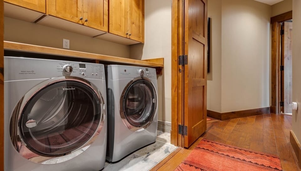 All of our One Steamboat Place residences have their own washer and dryer. (Photo is a representation, not actual.)