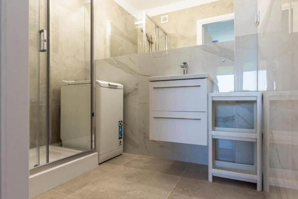 The bathroom includes all necessary toiletries for your convenience. 