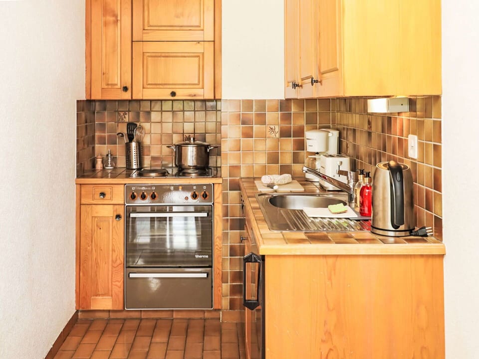 Brown, Cabinetry, Countertop, Building, Furniture, Kitchen, Sink, Wood, Kitchen Appliance, Kitchen Stove
