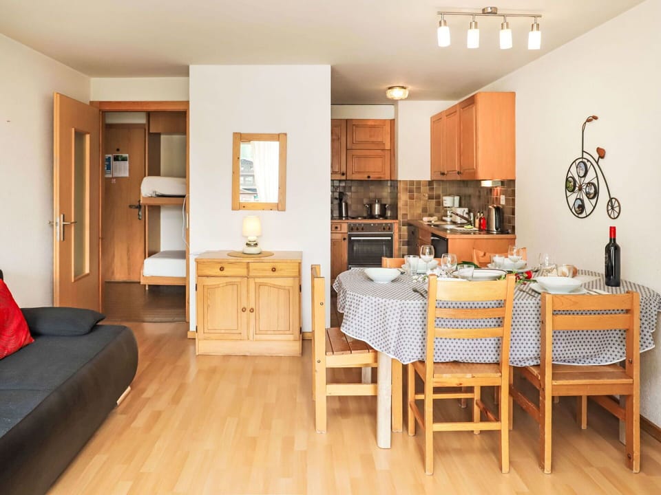 Table, Furniture, Cabinetry, Wood, Interior Design, Lighting, Orange, Drawer, Chair, Shelving