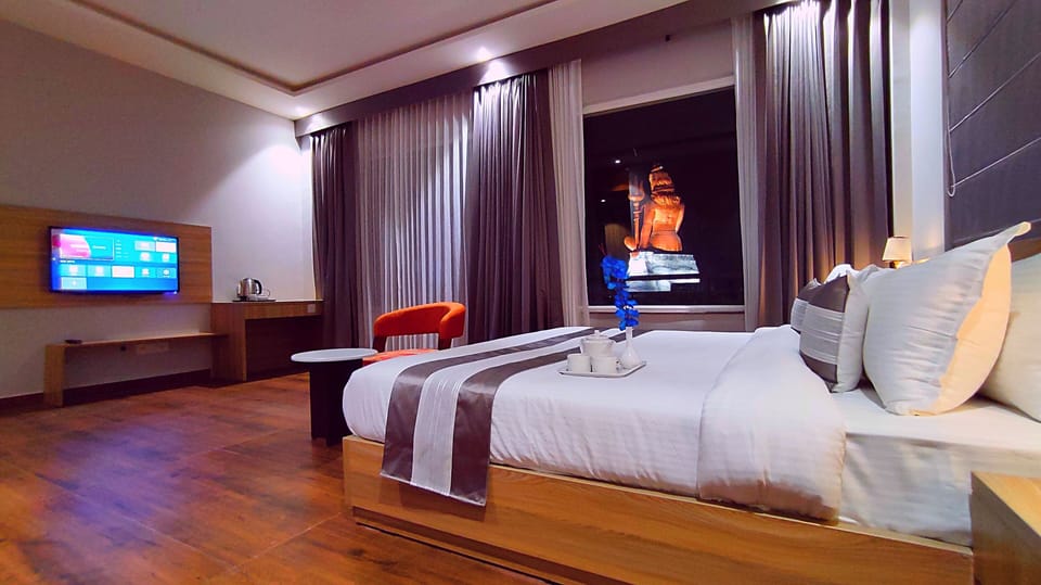 Premium Room | In-room safe, desk, laptop workspace, blackout drapes