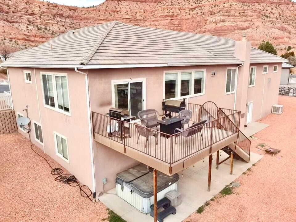 Gather on the back deck to tell stories 'round the fire pit, BBQ dinner, or just stargaze. Or, soak your muscles after a day of adventure in the private hot tub.