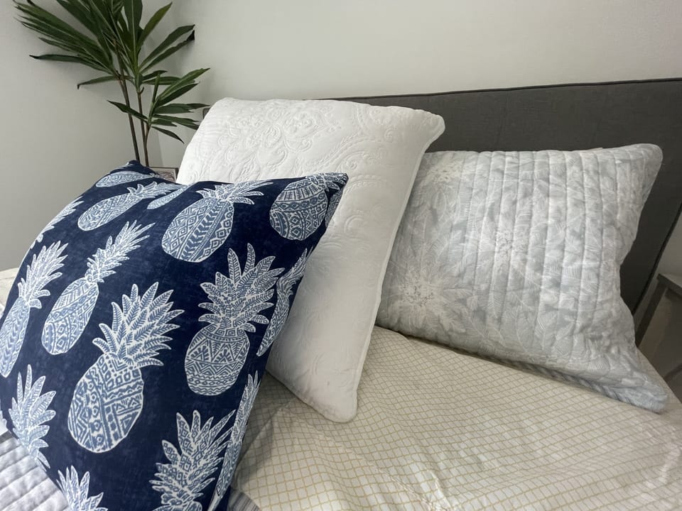 Inviting designer bedding. 
