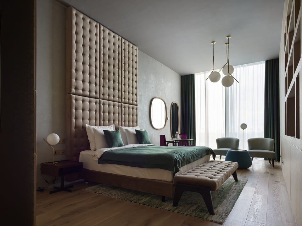 Deluxe Double Room | Pillowtop beds, minibar, in-room safe, blackout drapes