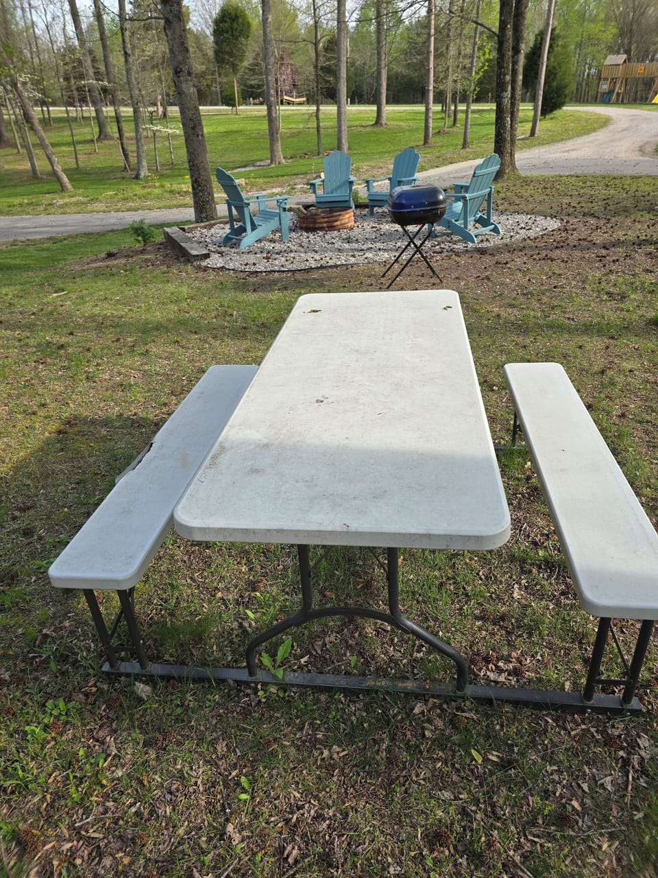 Charcoal grill by the firepit