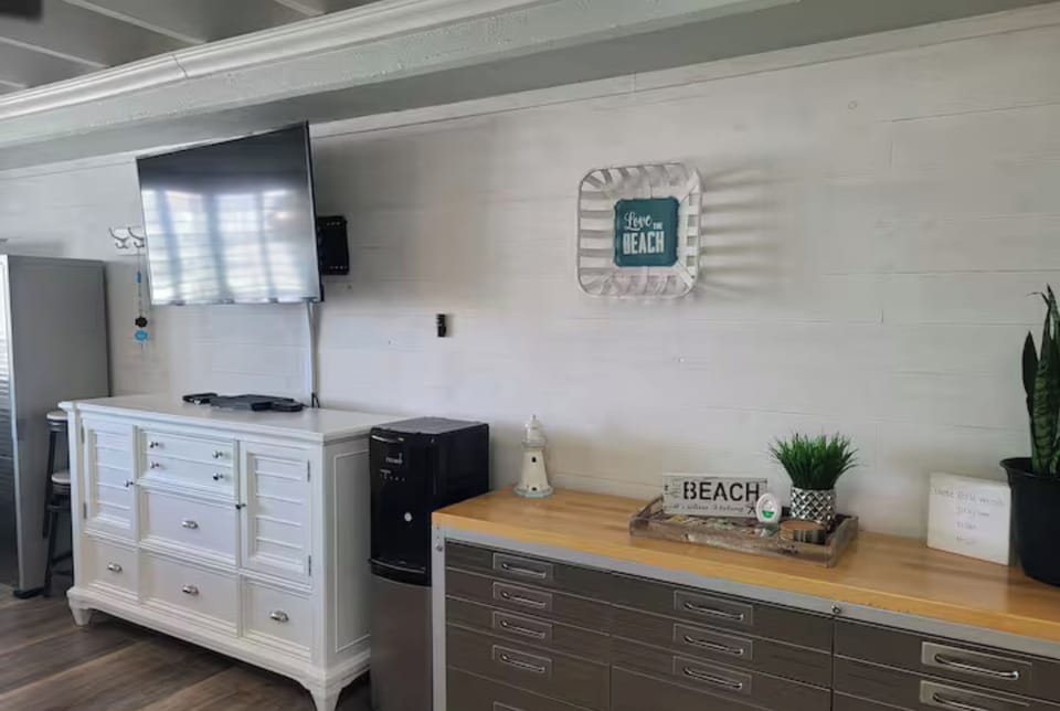 Bright living area with TV