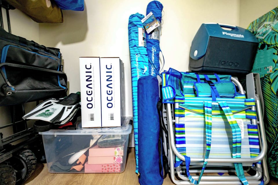 Puako Beach Condo #102 - Beach gear including beach chairs, umbrellas, coolers, snorkel gear, Boogie Boards, pool floats and more.
