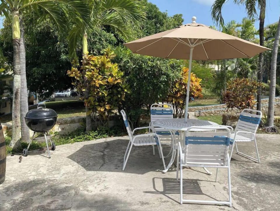 Poolside tables and grills for your enjoyment 