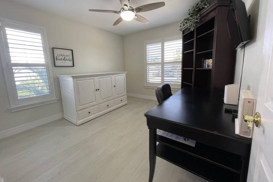 The den serves as a 3rd bedroom w/a queen murphy bed (enclosed in cabinet.) The TV is not operational.
