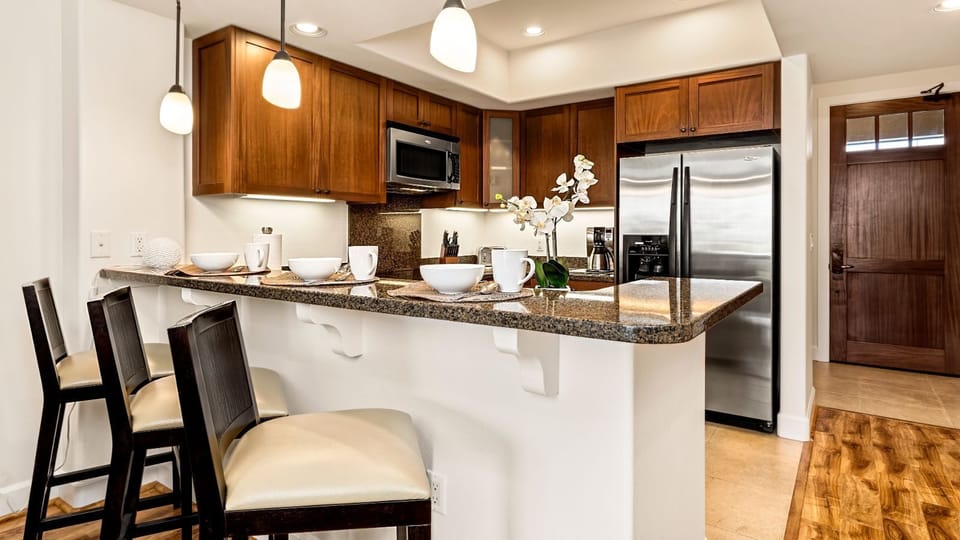 View of the kitchen from behind the breakfast bar of this Halii Kai condo.