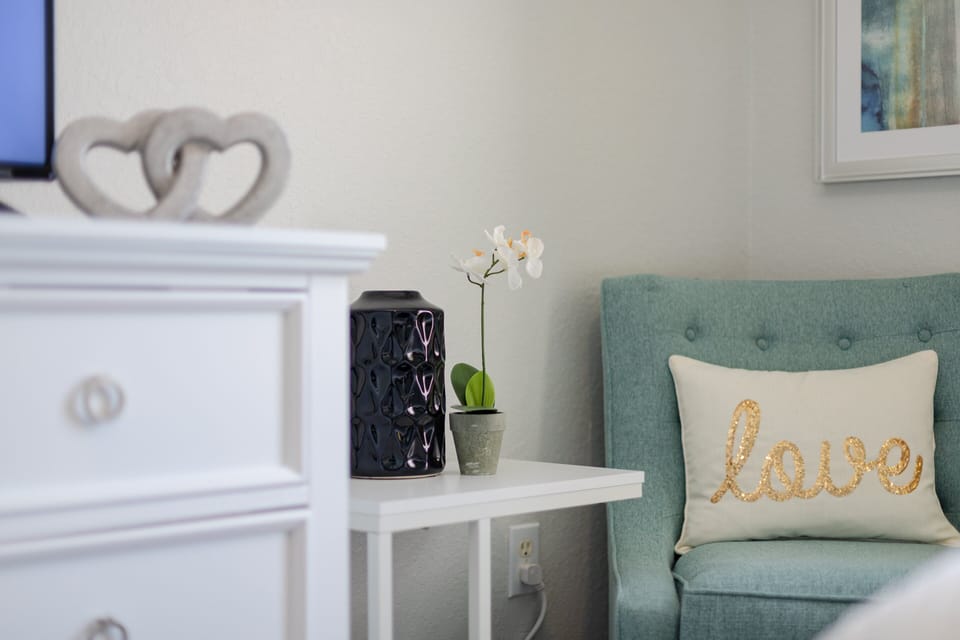 2nd bedroom with 2 queen beds, 65" smart TV and private bathroom.