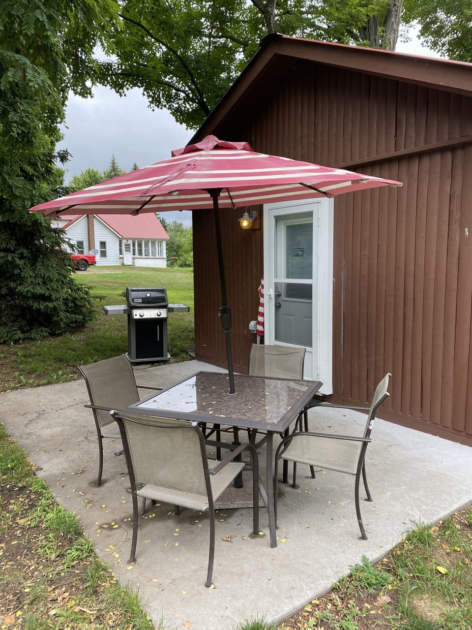 Patio with a Weber Grill in the back ground