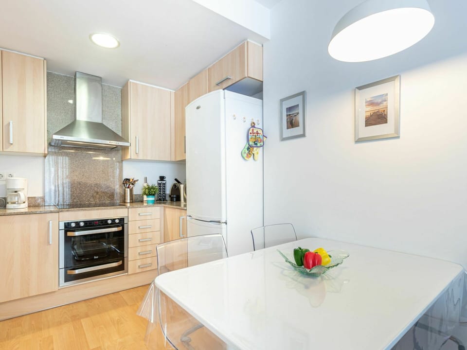 Furniture, Cabinetry, Property, Table, Countertop, Interior Design, Lighting, Kitchen Stove, Kitchen Appliance, Flooring