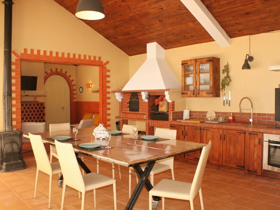 Table, Furniture, Property, Chair, Cabinetry, Wood, Countertop, Lighting, Orange, Interior Design