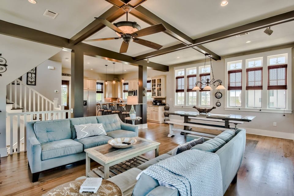 Spacious open concept living area drenched in natural light