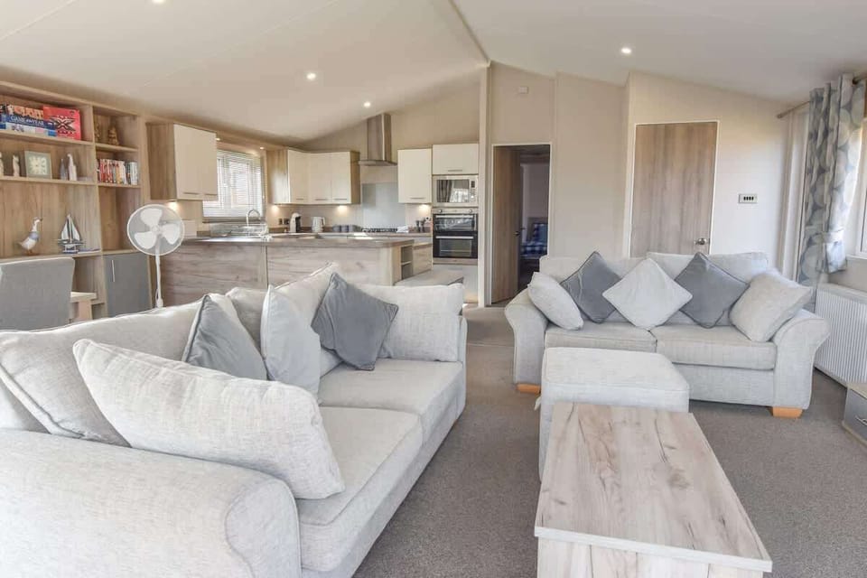 Alternate perspective of the living space at Rowan, showcasing layout, décor and relaxed ambience.
