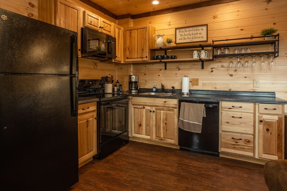 Complete kitchen with stove/oven, dishwasher, microwave and fridge