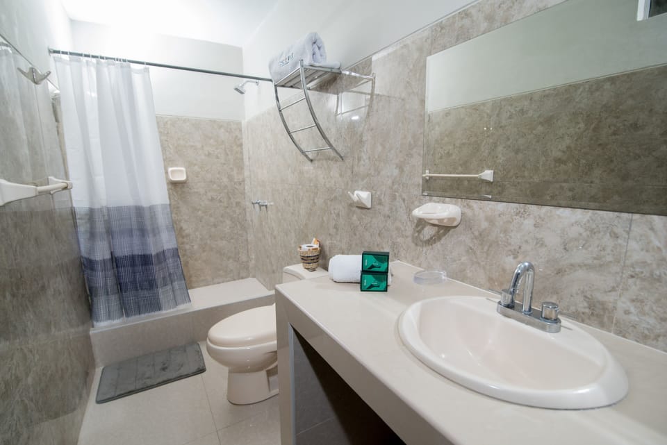 Standard Twin Room | Bathroom | Shower, designer toiletries, towels, soap