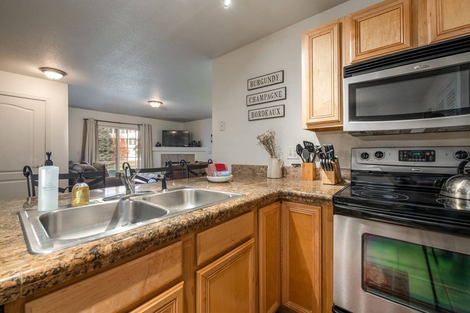 Able to spend time in the kitchen without missing out on what is happening in the living room!
