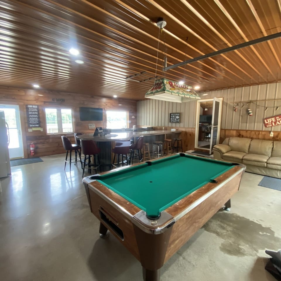 Rec room. Access to lower level is located behind the bar. 