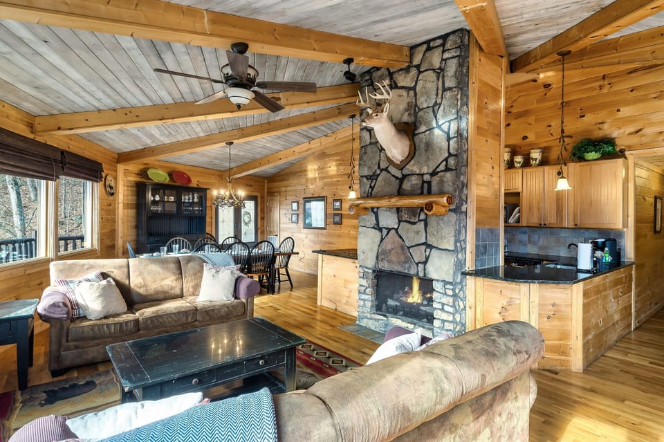 Family room with floor to ceiling gas fireplace