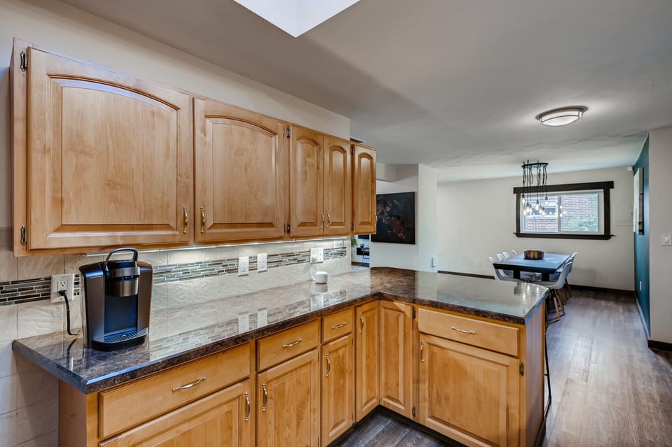 Main level kitchen, 1 of 2. Fully stocked including Keurig+coffee, blender, etc.