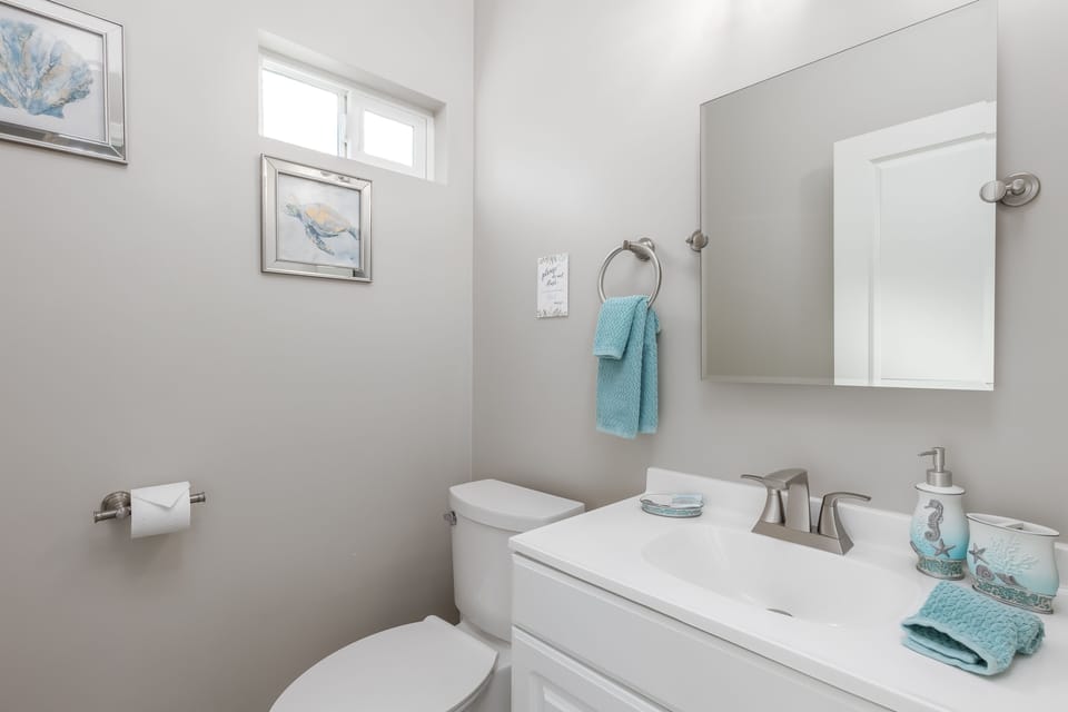 Half-Bath located inside on of the Upstairs Bedrooms