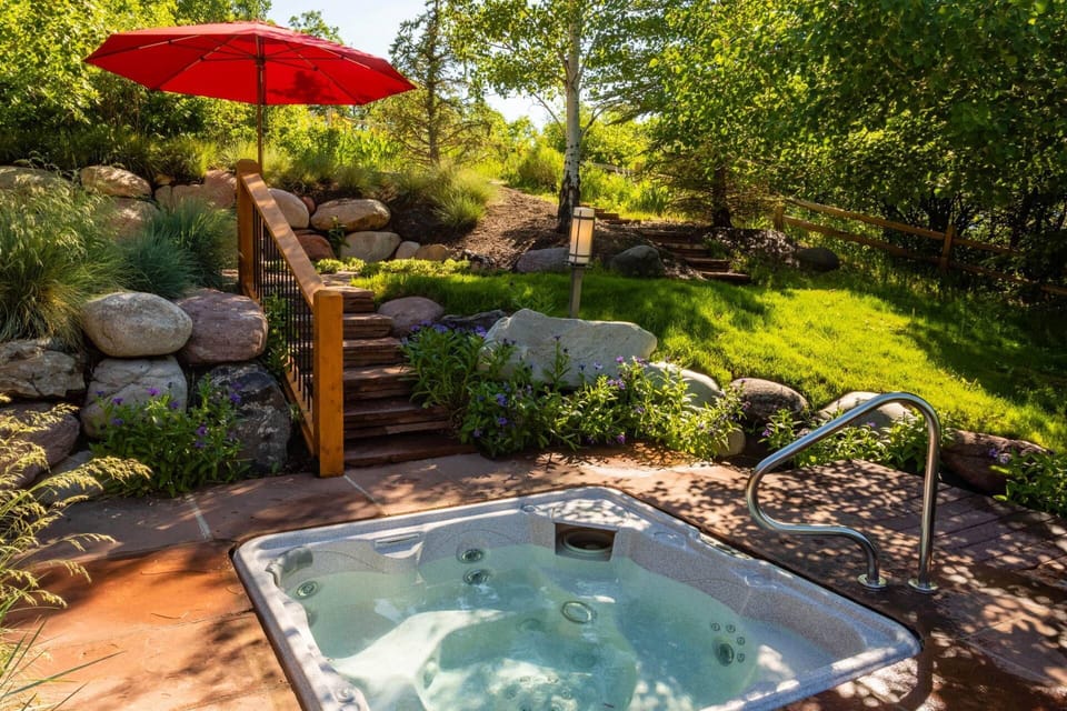 The private hot tub is located off of the master bedroom on the upper level of the outdoor patio area.