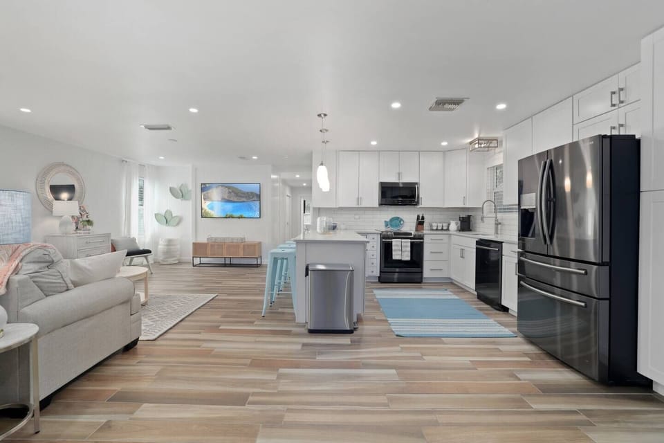 Open living area seamlessly connects to the kitchen