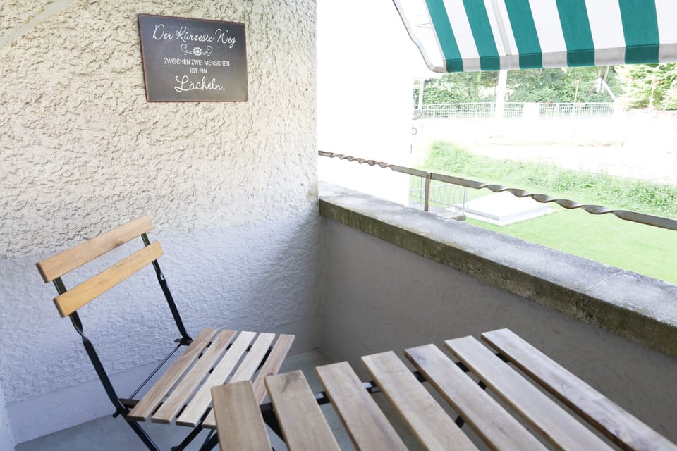 Balcony facing backyard.