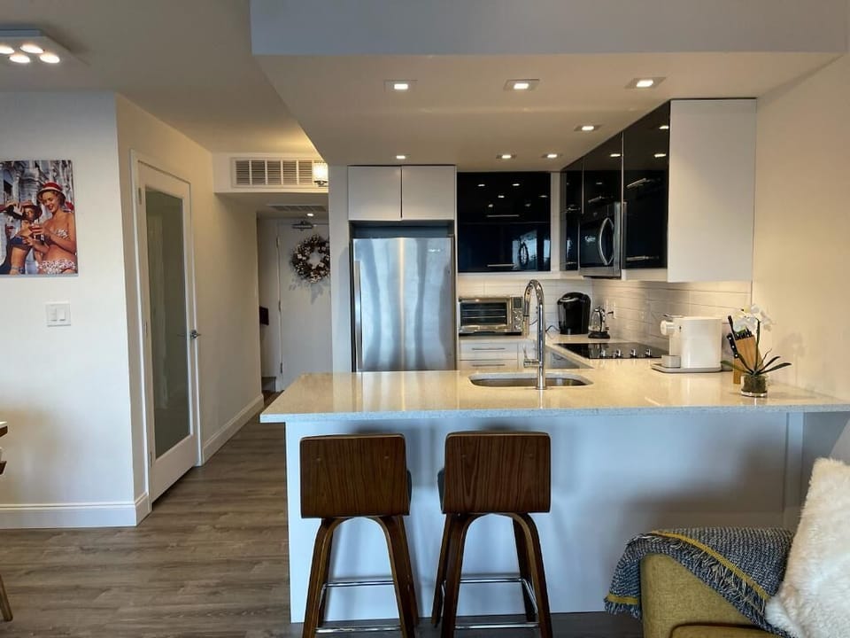 Kitchen with a Keurig latte machine, as well as regular coffee maker.