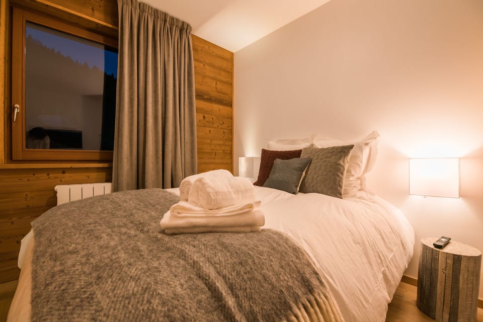 Drift to sleep in a comfortable bed after a day outside.