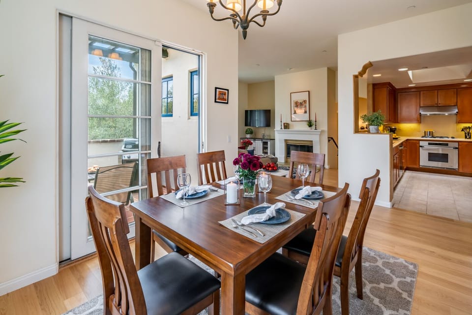 Open floor plan allows for easy access from dining room into kitchen, terrace, or living room